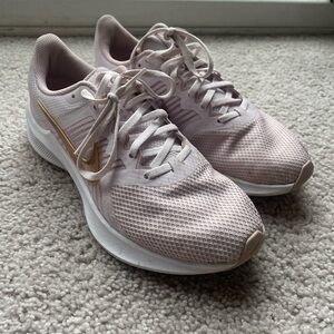 Women's Pink and Gold Nike Downshift Tennis Shoes